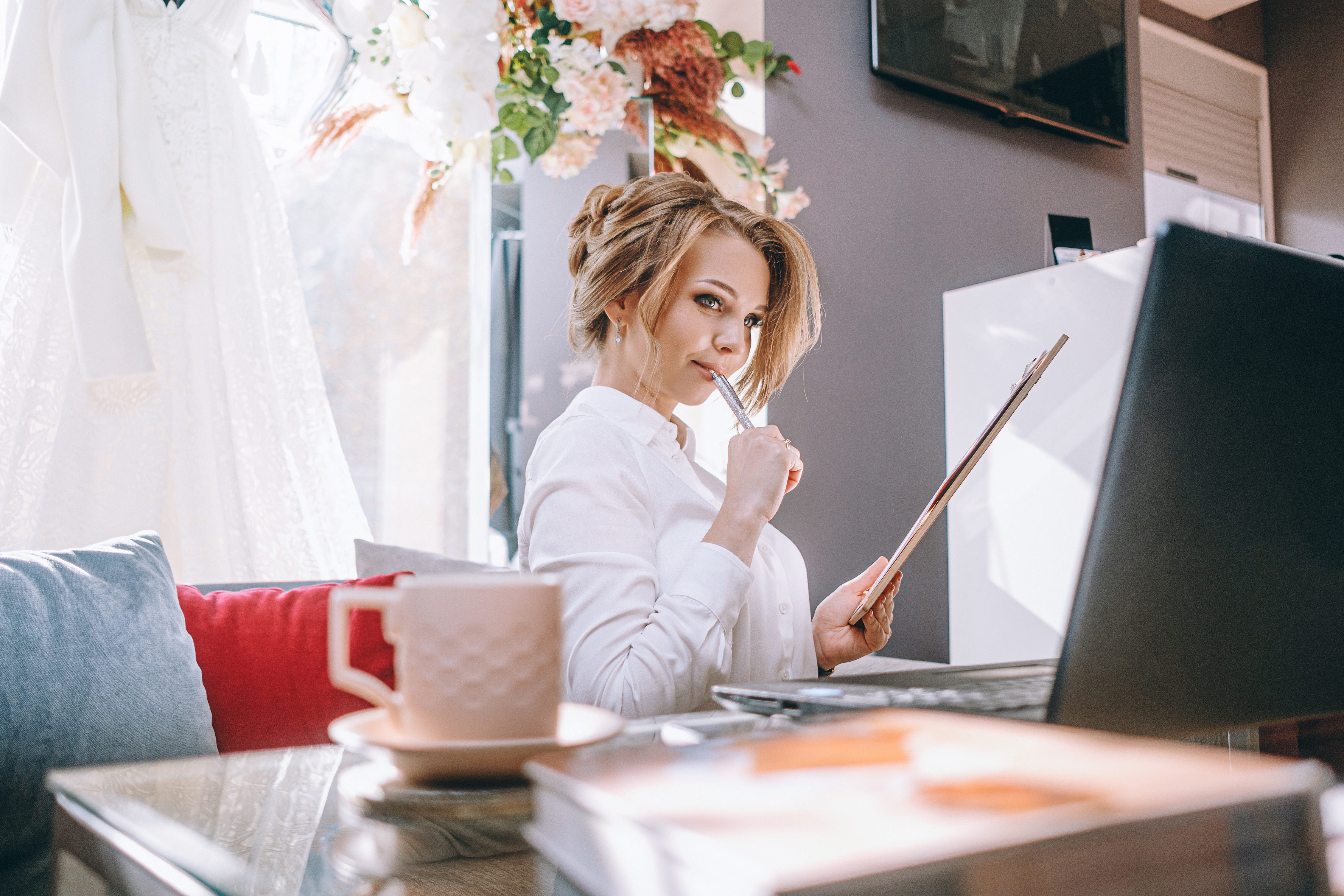 Wedding planner looking at computer