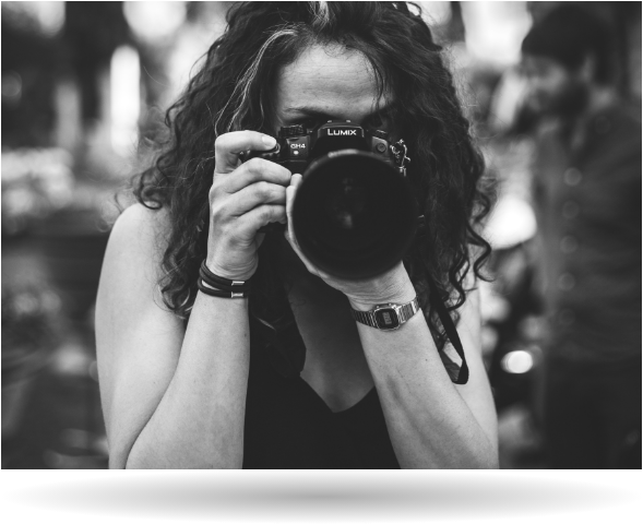 black and white image of a photographer